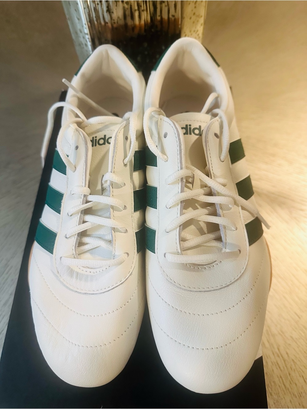 adidas White Sneakers with Dark Green Stripes